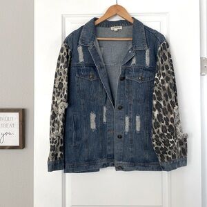 Distressed cheetah denim jacket